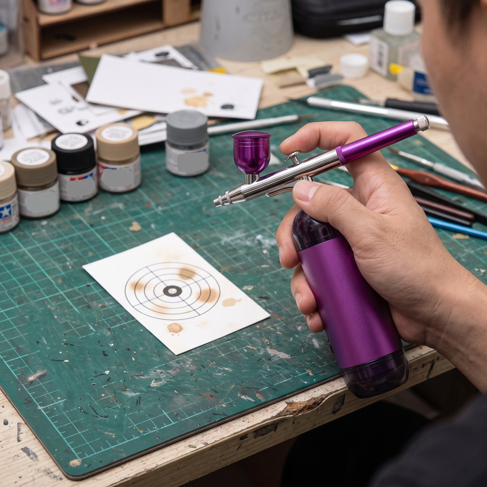 A Purple Handheld Assembly