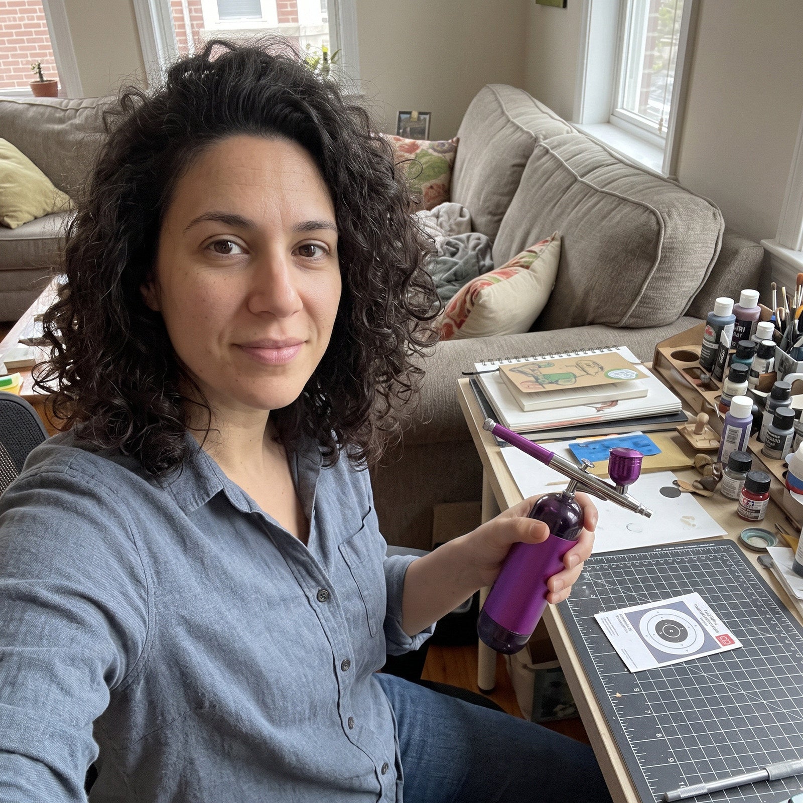 Alex Near Her Creative Desk